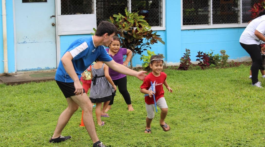 Children have fun playing outside and getting fit with the encourage of a volunteer sports coach. A Projects Abroad volunteer sports coach encourages children to play outside to increase their activity levels in Samoa.